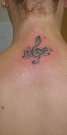 Татуировка на затылке - музыка