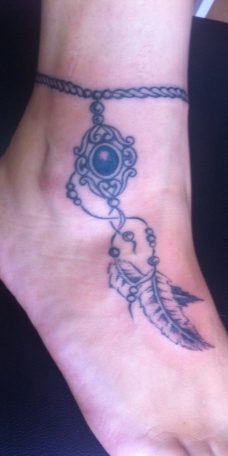 Татуировка на стопе