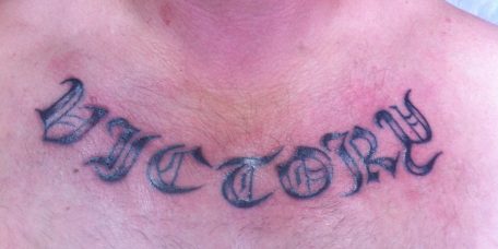 Татуировка на груди "Victory"