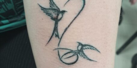 Татуировка две ласточки